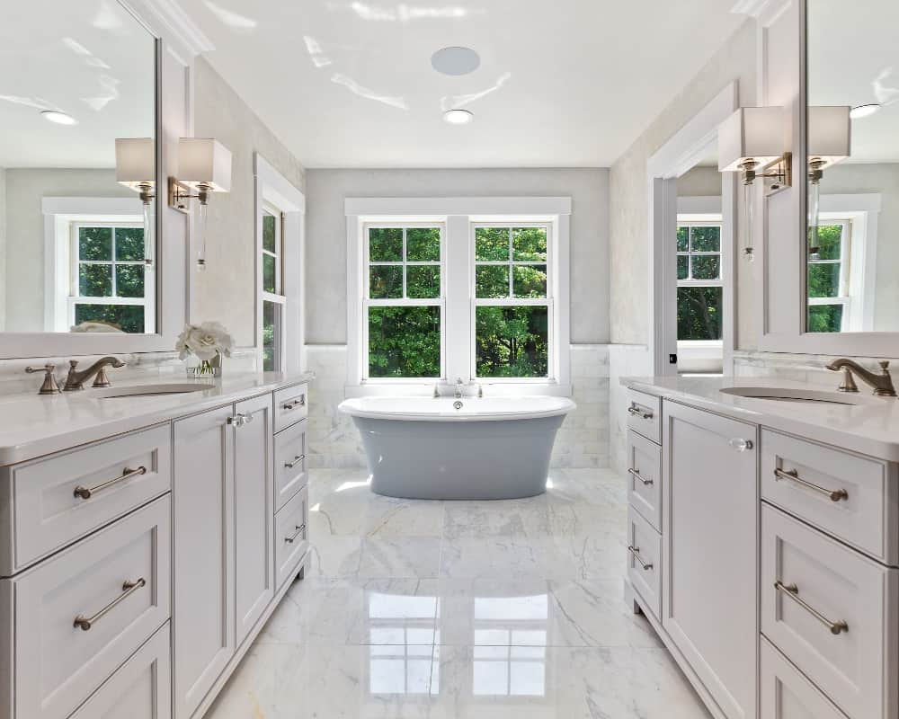 A beautiful bathroom with marble floors.